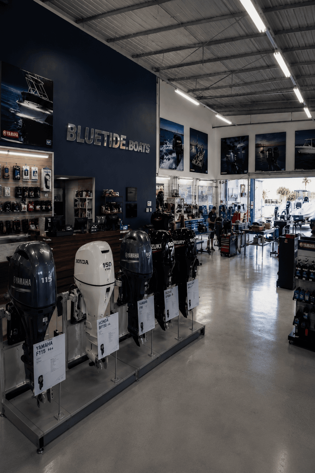 BlueTide.boats marine showroom with outboard motors on display